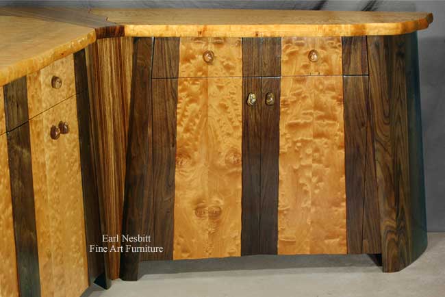 custom made designer cabinet showing smaller cabinet with zebrawood centerpiece connected